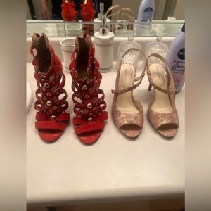 Two pairs of heels. Zise  7 1/2 One pair Red and the other Pink and Gold.